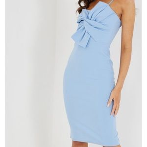 Brand new! size 6 midi dress. Light blue, front bow, slit